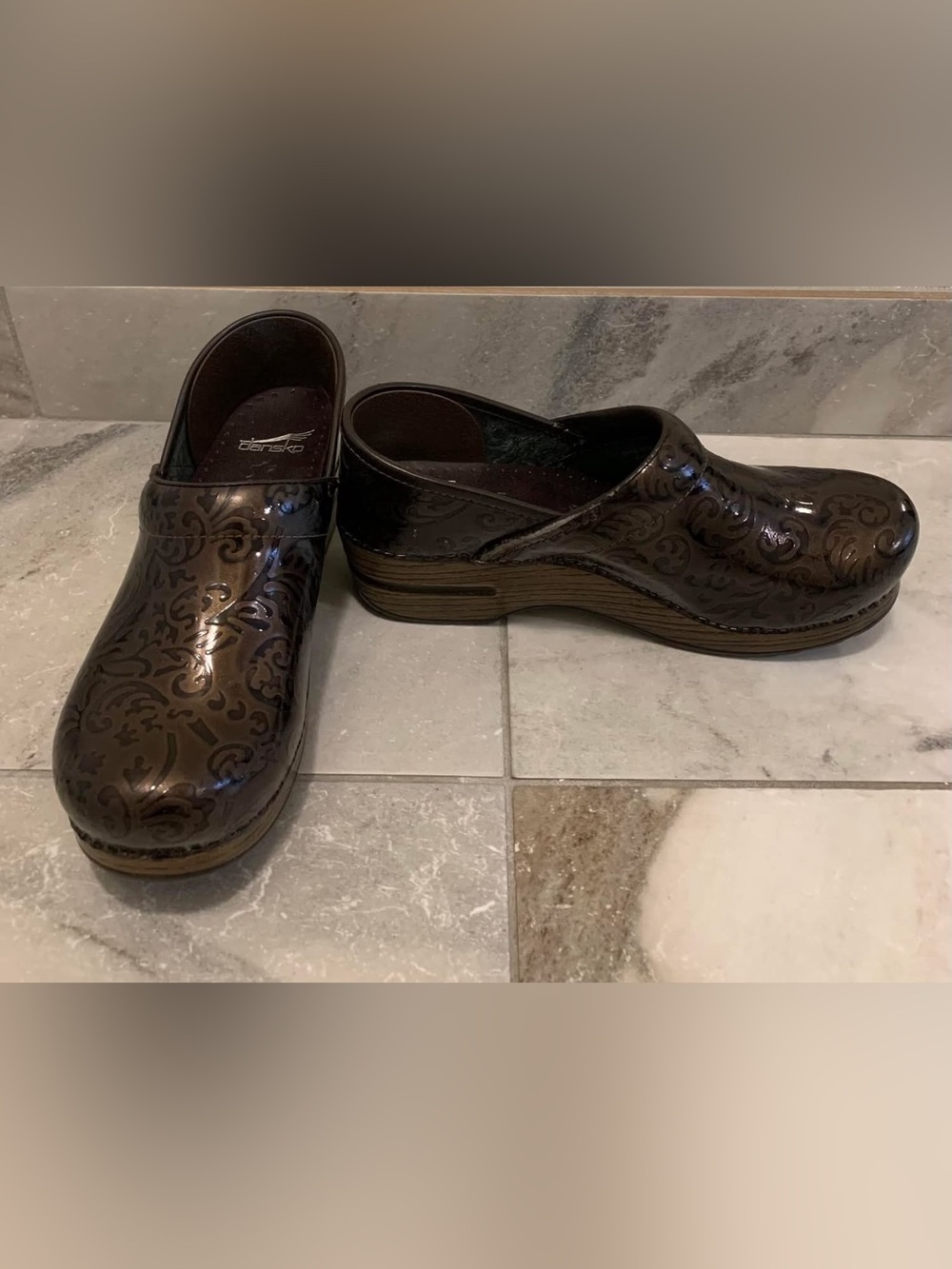 Dansko Brown Patent Embossed Clogs